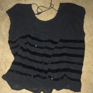 Formal blouse with sequins on the front